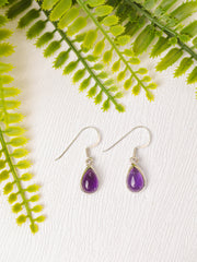 Zilveren amethist oorbellen ovaal gepolijst