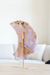 Roze amethist maan op gouden standaard