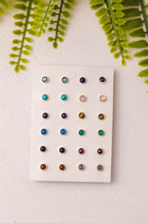 Div. soorten zilveren knopjes met edelstenen