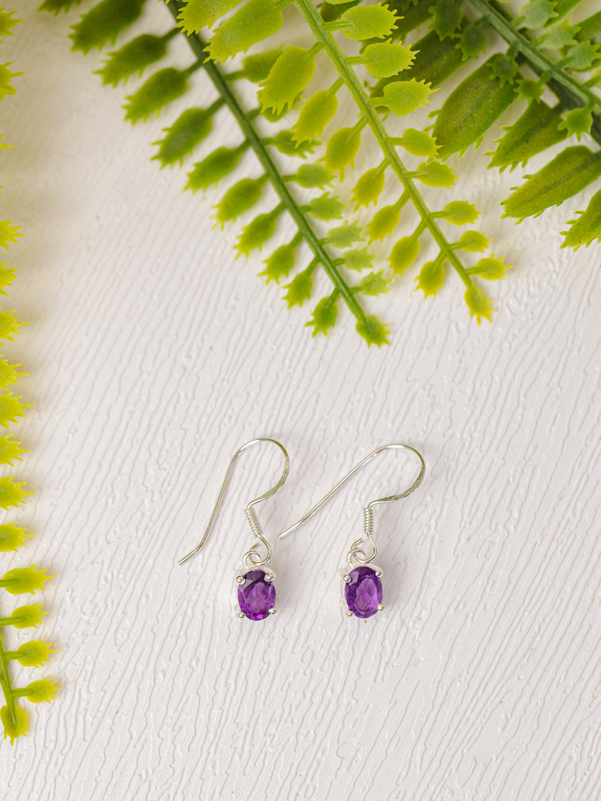 Zilveren amethist oorbellen ovaal