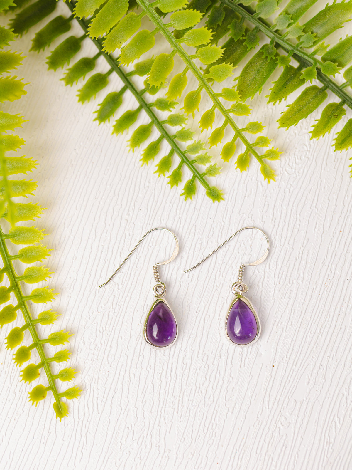 Zilveren amethist oorbellen ovaal gepolijst