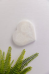 Seleniet hart onderzetter met vleugels