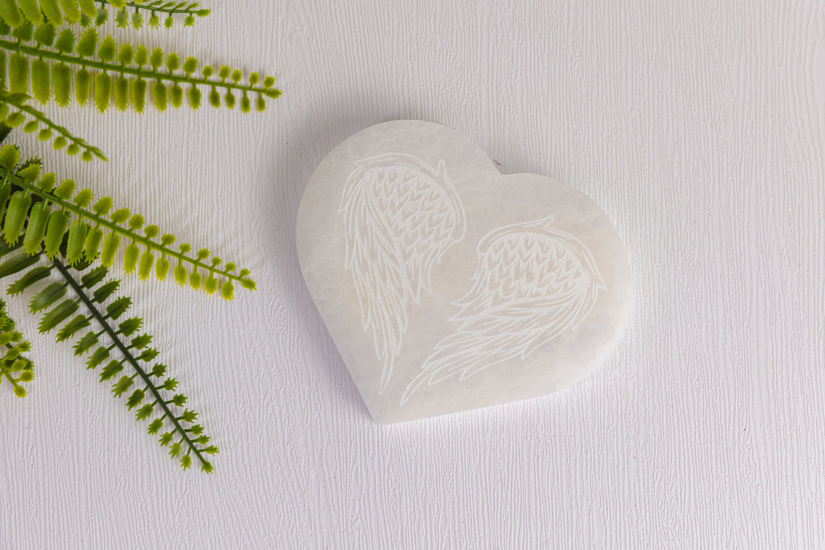 Seleniet hart onderzetter met vleugels