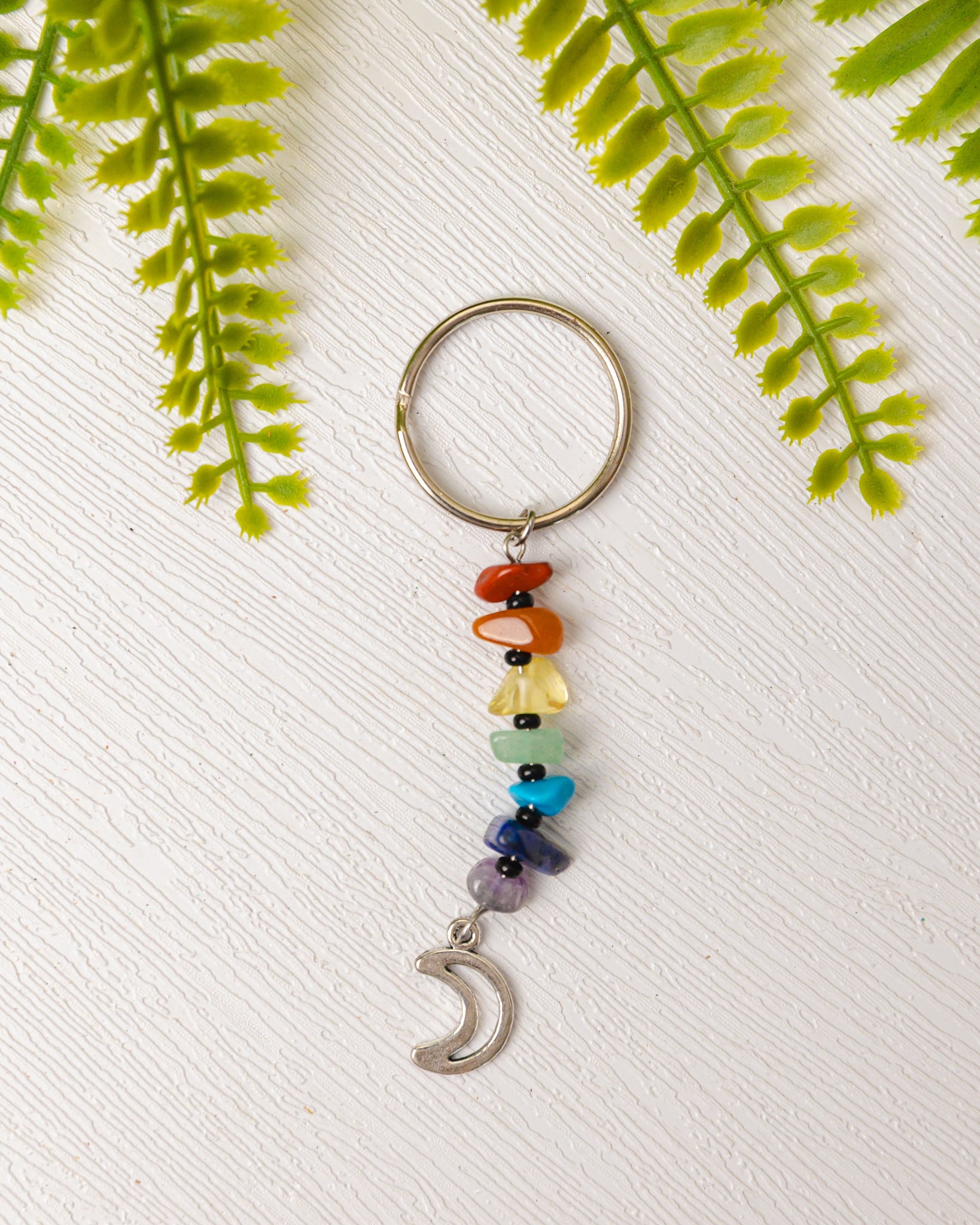 Zilveren chakra sleutelhanger met bedeltje