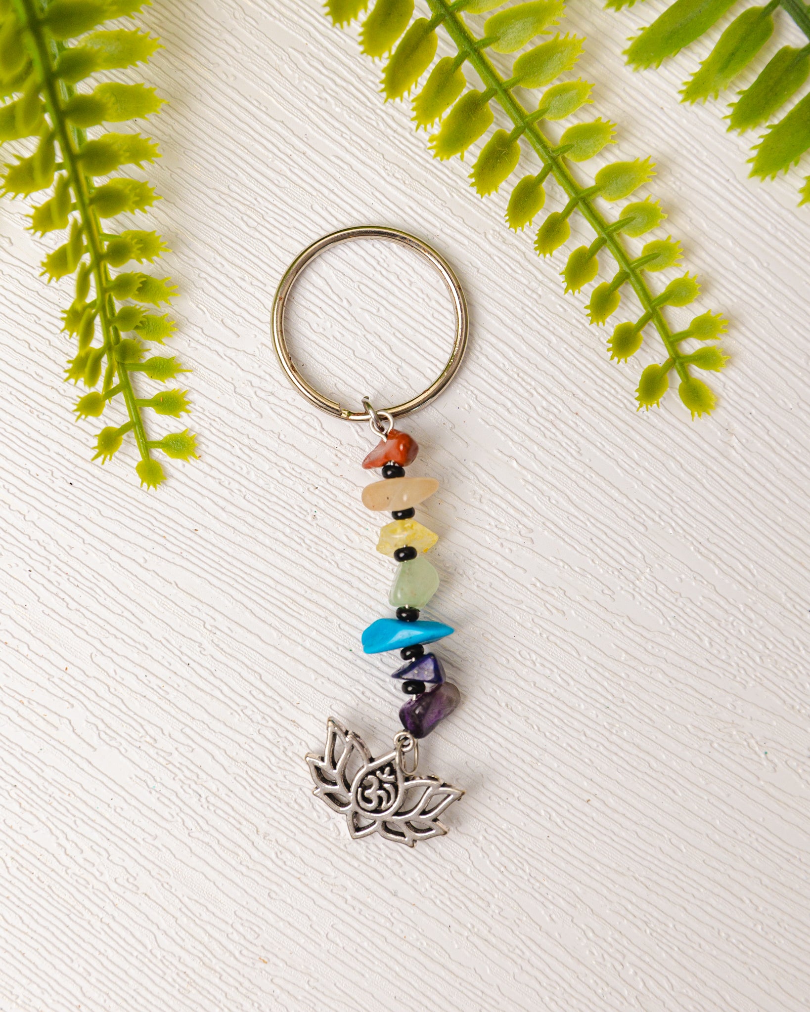 Zilveren chakra sleutelhanger met bedeltje