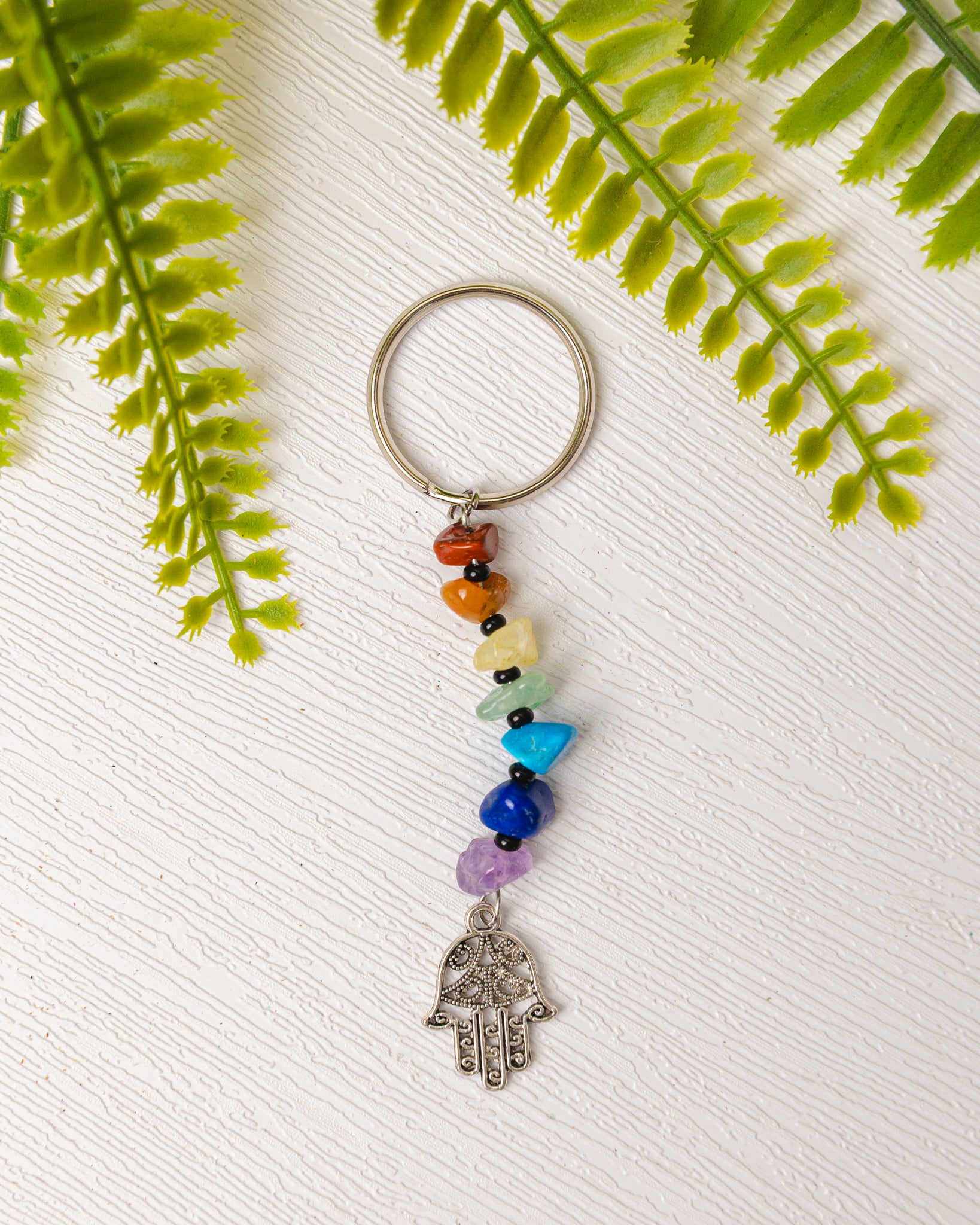 Zilveren chakra sleutelhanger met bedeltje