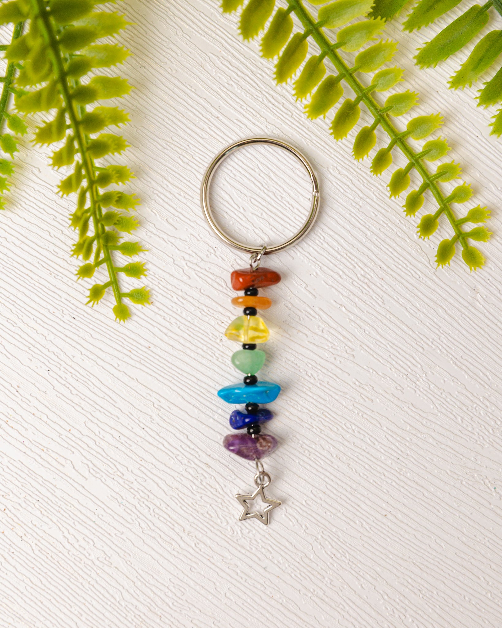 Zilveren chakra sleutelhanger met bedeltje