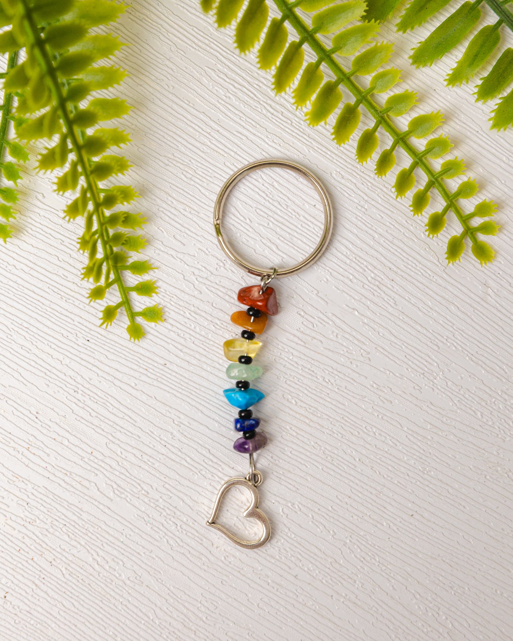 Zilveren chakra sleutelhanger met bedeltje