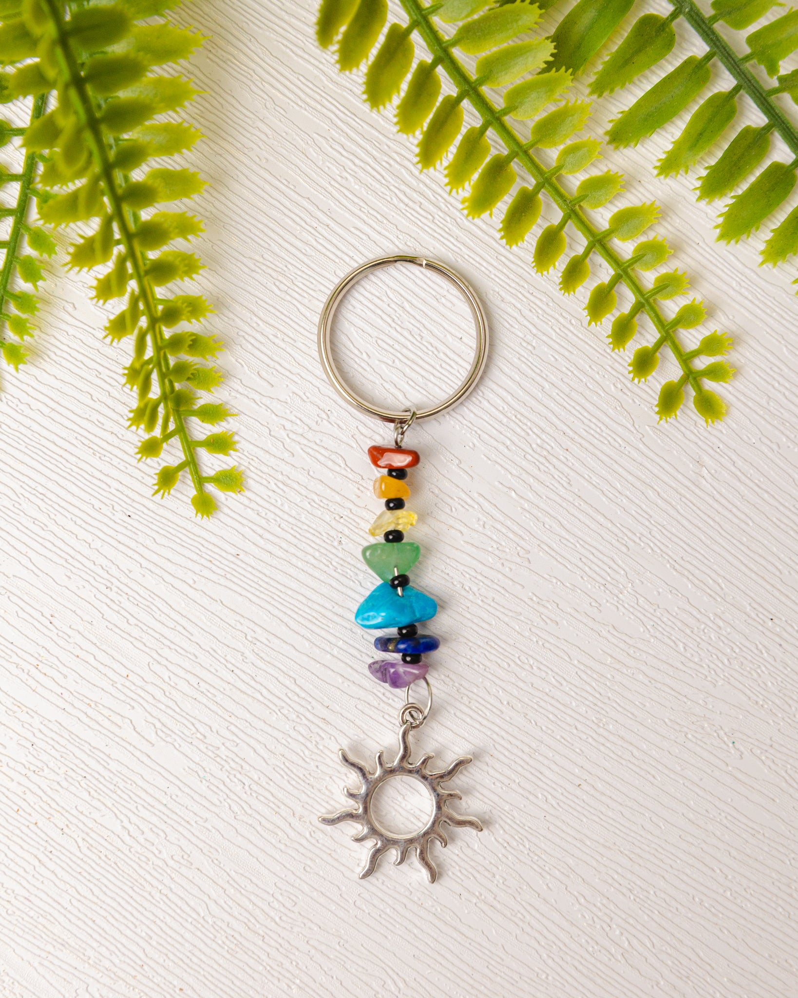 Zilveren chakra sleutelhanger met bedeltje